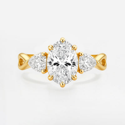 The Rebecca Ring - Oval Trilogy with Pear Side Stones