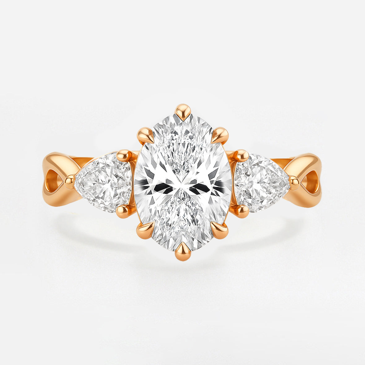 The Rebecca Ring - Oval Trilogy with Pear Side Stones