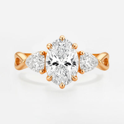 The Rebecca Ring - Oval Trilogy with Pear Side Stones