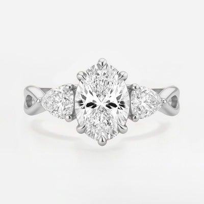 The Rebecca Ring - Oval Trilogy with Pear Side Stones