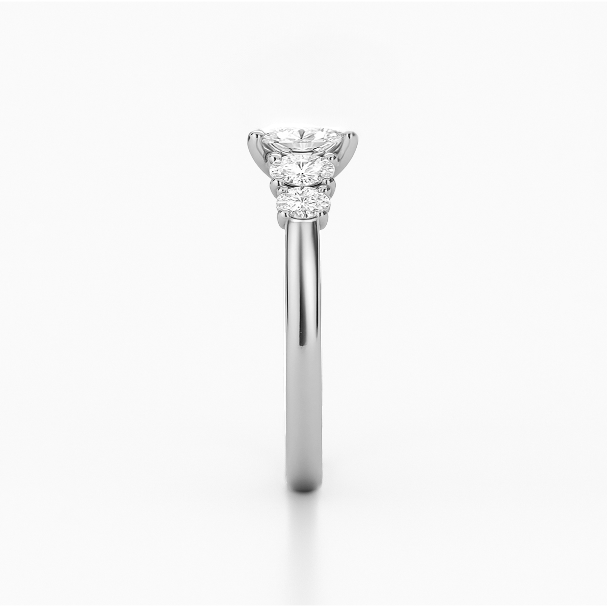 The Valerie Ring - Oval Cut Diamond with Side Stones