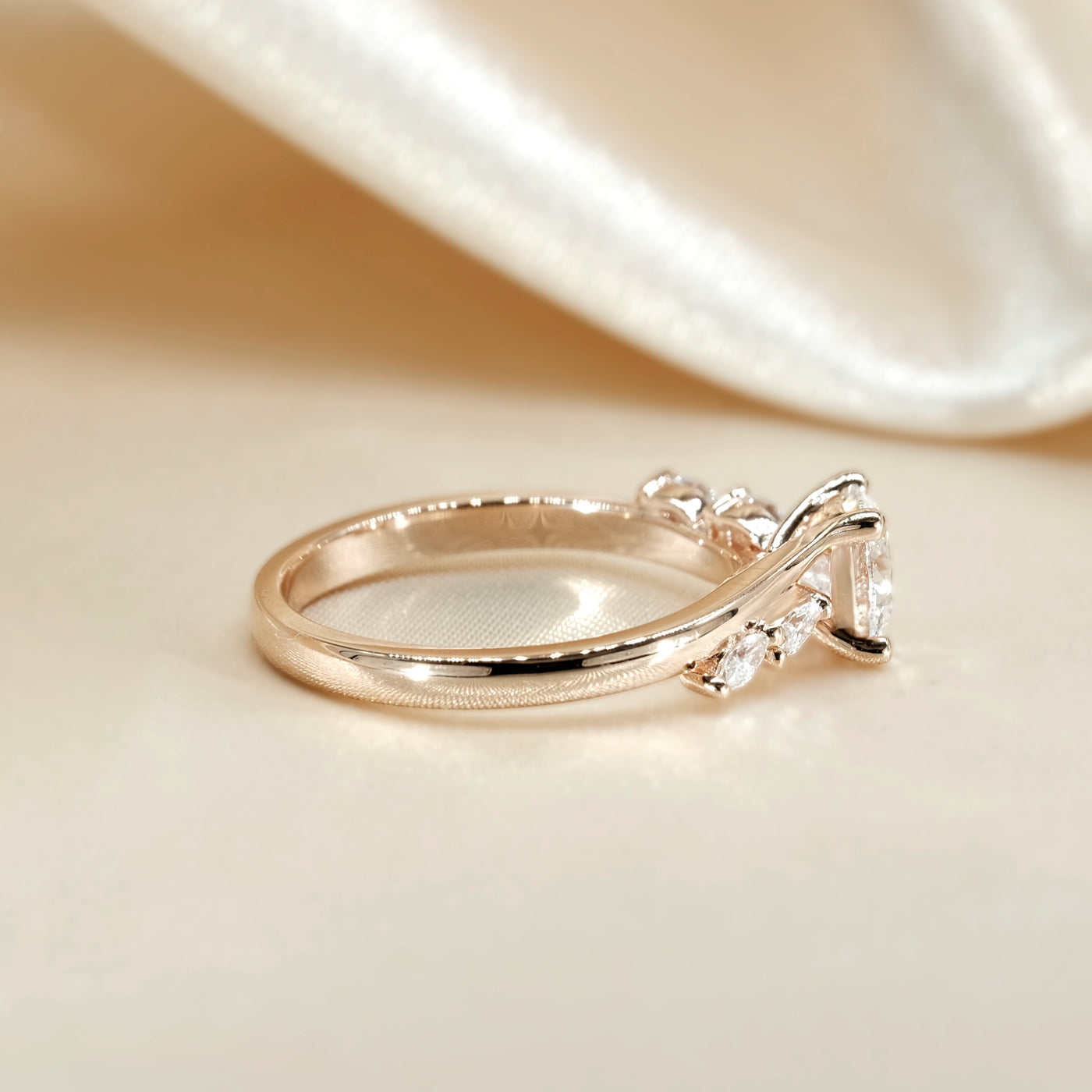 The Melanie Ring - Oval Diamond with Marquise Accents