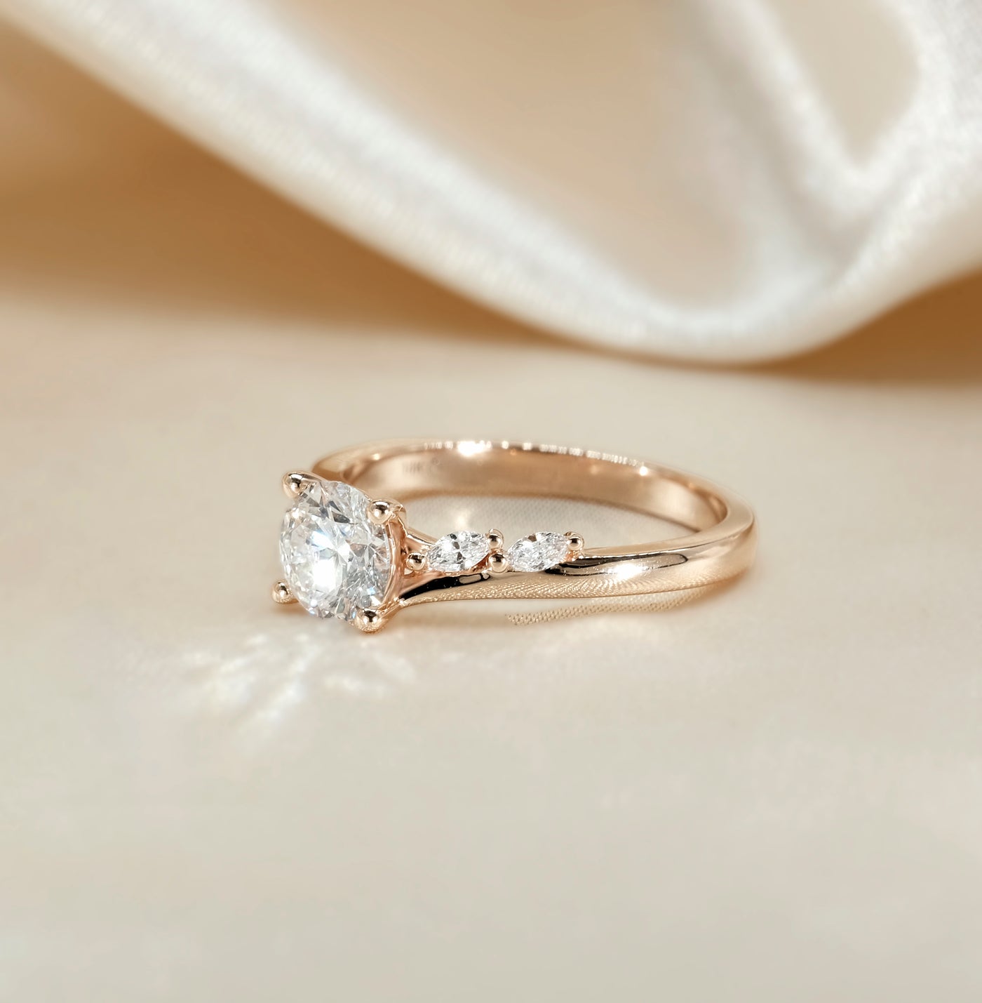 The Melanie Ring - Oval Diamond with Marquise Accents