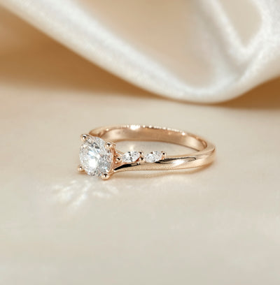 The Melanie Ring - Oval Diamond with Marquise Accents