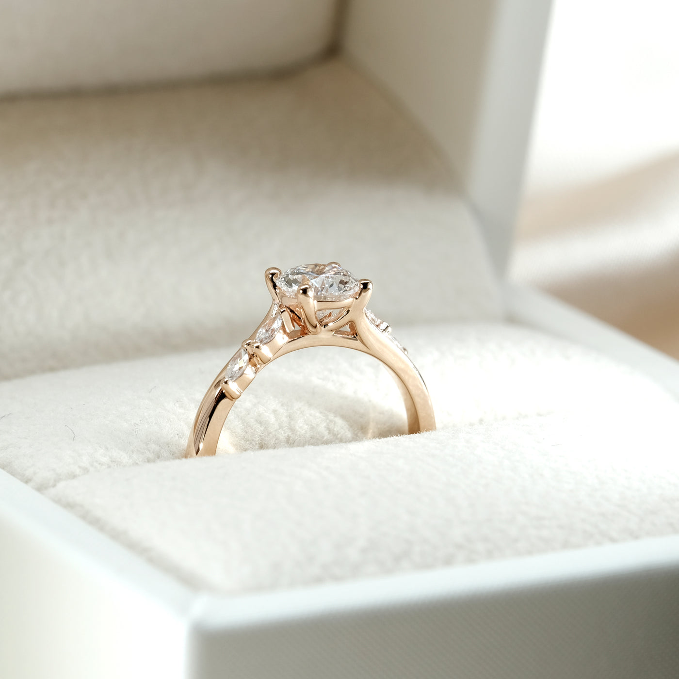 The Melanie Ring - Oval Diamond with Marquise Accents