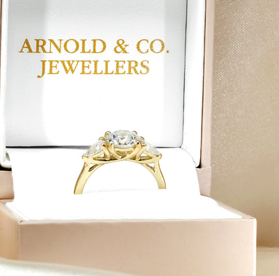 The Alexandra Ring - Round Trilogy with Pear Side Stones